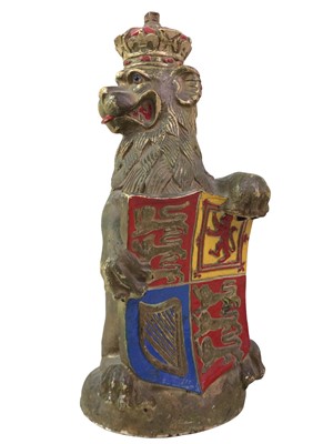 Lot 735 - GILT LION WITH SHIELD
