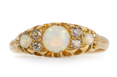 Lot 559 - OPAL AND DIAMOND RING