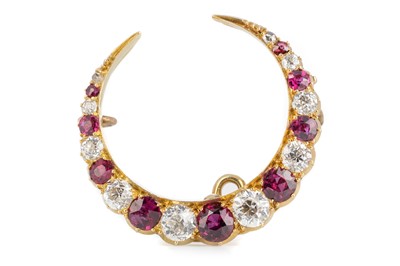 Lot 565 - RUBY AND DIAMOND CRESCENT MOON BROOCH