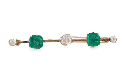 Lot 567 - EMERALD AND CUBIC ZIRCONIA BAR BROOCH