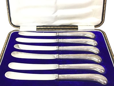 Lot 130 - TWO SETS OF SIX SILVER BUTTER KNIVES