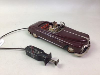 Lot 163 - REMOTE CONTROL TIN PLATE MODEL CAR