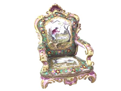 Lot 342 - CONTINENTAL PORCELAIN MINIATURE ARMCHAIR