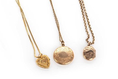 Lot 455 - THREE LOCKETS ON CHAINS