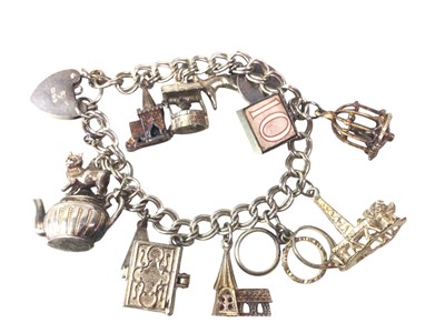 Lot 453 - SILVER CHARM BRACELET