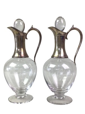 Lot 643 - PAIR OF SILVER COLLARED CLARET JUGS