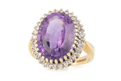Lot 404 - AMETHYST AND DIAMOND RING