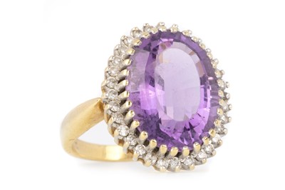 Lot 404 - AMETHYST AND DIAMOND RING