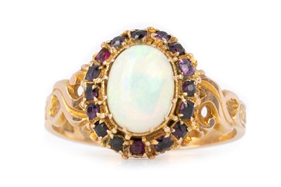 Lot 407 - VICTORIAN GARNET AND OPAL RING