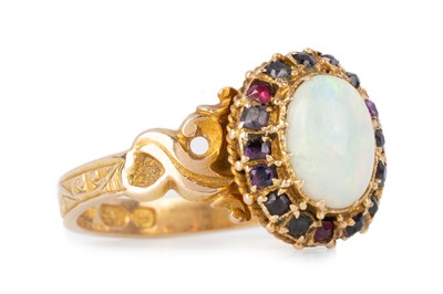 Lot 407 - VICTORIAN GARNET AND OPAL RING