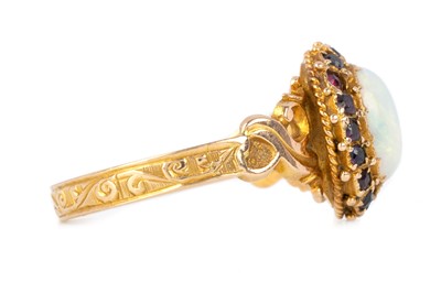 Lot 407 - VICTORIAN GARNET AND OPAL RING