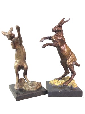 Lot 37 - TWO BRONZED FIGHTING HARE SCULPTURES