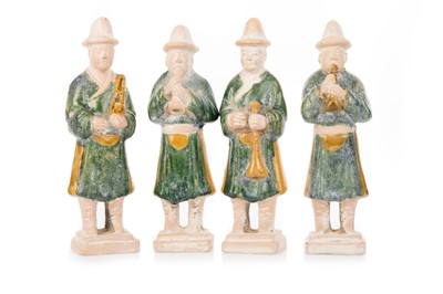 Lot 615 - FOUR CHINESE MING STYLE GLAZED POTTERY ATTENDANTS
