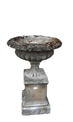 Lot 416 - TWO COMPOSITE STONE GARDEN URNS