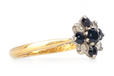 Lot 509 - SAPPHIRE AND DIAMOND CLUSTER RING
