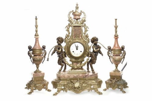 Lot 1064 - FRENCH GILT METAL AND ROUGE MARBLE MANTEL...
