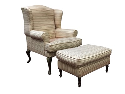 Lot 595 - WINGBACK ARMCHAIR AND MATCHING STOOL