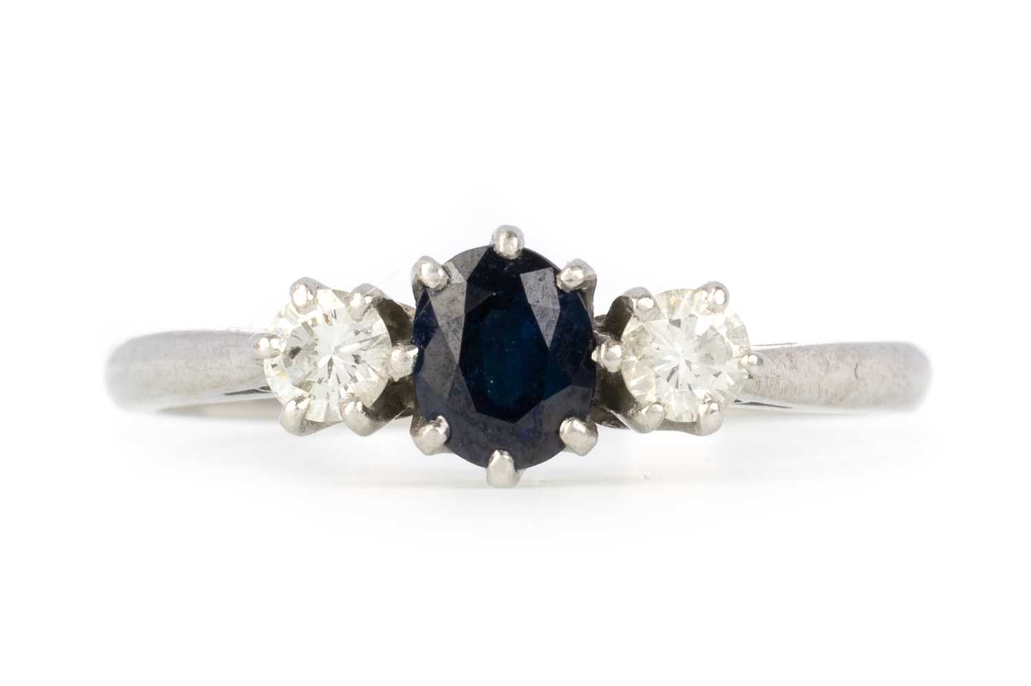 Lot 504 - SAPPHIRE AND DIAMOND THREE STONE RING