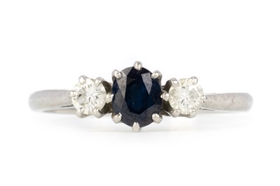 Lot 504 - SAPPHIRE AND DIAMOND THREE STONE RING