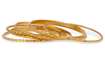 Lot 508 - SEVEN HIGH CARAT GOLD BANGLES