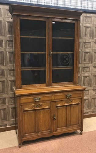 Lot 1236 - VICTORIAN OAK CABINET BOOKCASE the moulded...