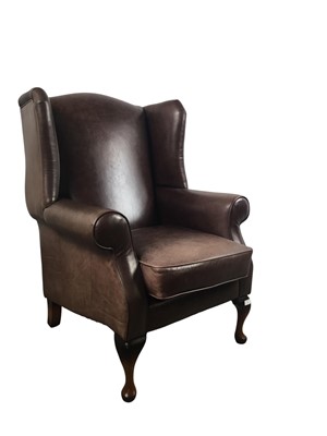 Lot 224 - LEATHER WINGBACK CHAIR
