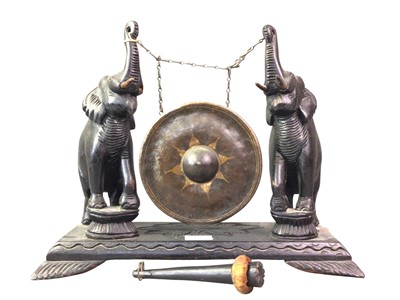 Lot 281 - EBONISED TABLE GONG