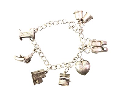 Lot 440 - WHITE METAL CHARM BRACELET