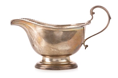 Lot 887 - GEORGE V SILVER SAUCE BOAT