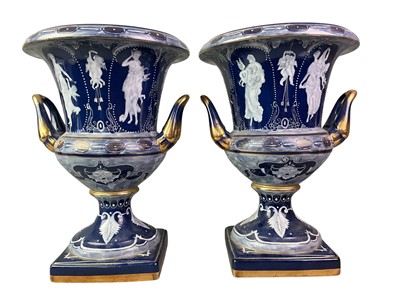 Lot 73 - PAIR OF CONTINENTAL SERVES STYLE PORCELAIN URN SHAPED VASES