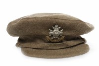 Lot 1371 - WWI TRENCH CAP AND BADGE reportedly once...