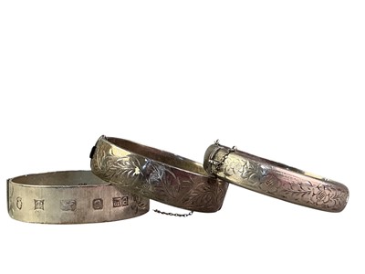 Lot 167 - COLLECTION OF SILVER BANGLES AND RINGS