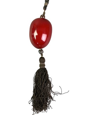 Lot 178 - TASSELLED BEAD NECKLACE