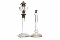 Lot 1393 - TWO CUT GLASS OIL LAMPS one with square base...