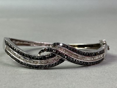Lot 297 - SILVER DIAMOND SET BANGLE