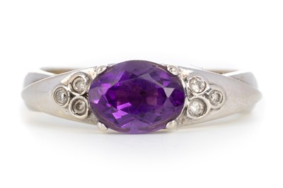 Lot 683 - AMETHYST AND DIAMOND RING