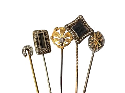 Lot 105 - FIVE STICK PINS