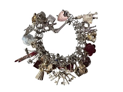 Lot 347 - SILVER CHARM BRACELET