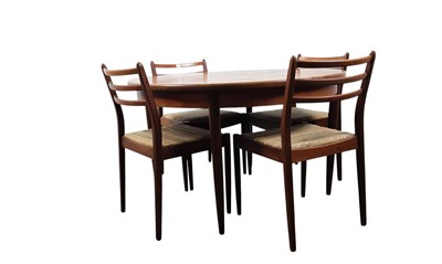 Lot 485 - TEAK CIRCULAR EXTENDING DINING TABLE