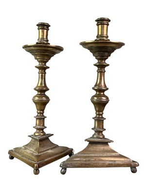 Lot 687 - TWO PAIRS OF VICTORIAN BRASS CANDLESTICKS