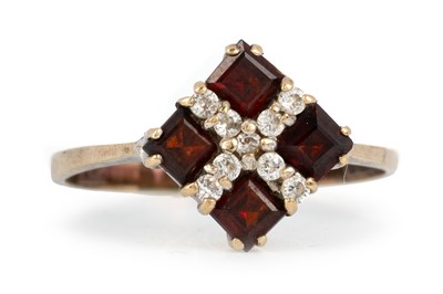 Lot 657 - GARNET AND DIAMOND CLUSTER RING