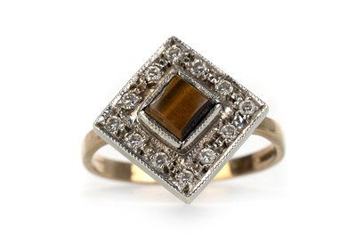 Lot 740 - TIGER'S EYE AND DIAMOND CLUSTER RING