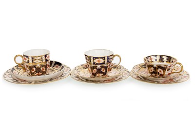 Lot 507 - THREE ROYAL CROWN DERBY TRIO SETS