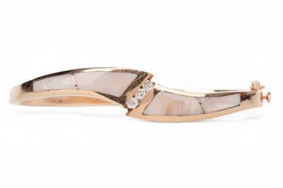 Lot 423 - MOTHER OF PEARL AND DIAMOND BANGLE