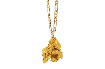 Lot 432 - GOLD NUGGET PENDANT ON CHAIN