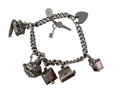 Lot 194 - SILVER CHARM BRACELET