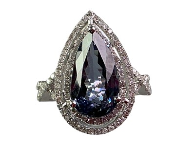 Lot 234 - TANZANITE AND DIAMOND CLUSTER RING