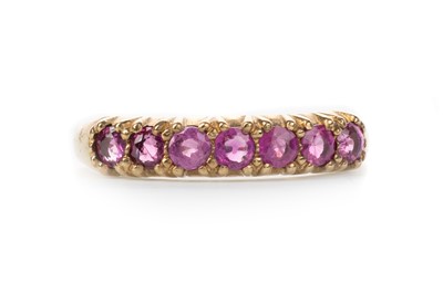 Lot 441 - PINK SAPPHIRE HALF ETERNITY RING
