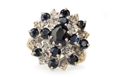 Lot 450 - SAPPHIRE AND DIAMOND CLUSTER RING