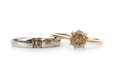 Lot 504 - TWO COGNAC DIAMOND RINGS